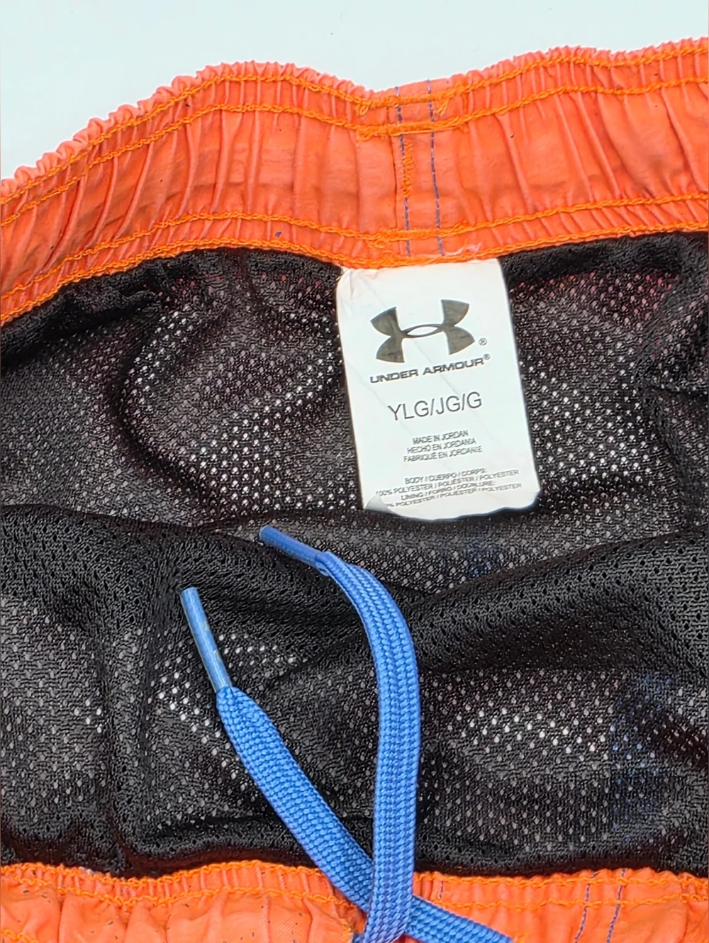 Under Armour boys' gradient orange and blue swim trunks size L